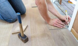 handyman installing new flooring